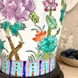 Chinese enamelled earthenware jar with wooden base