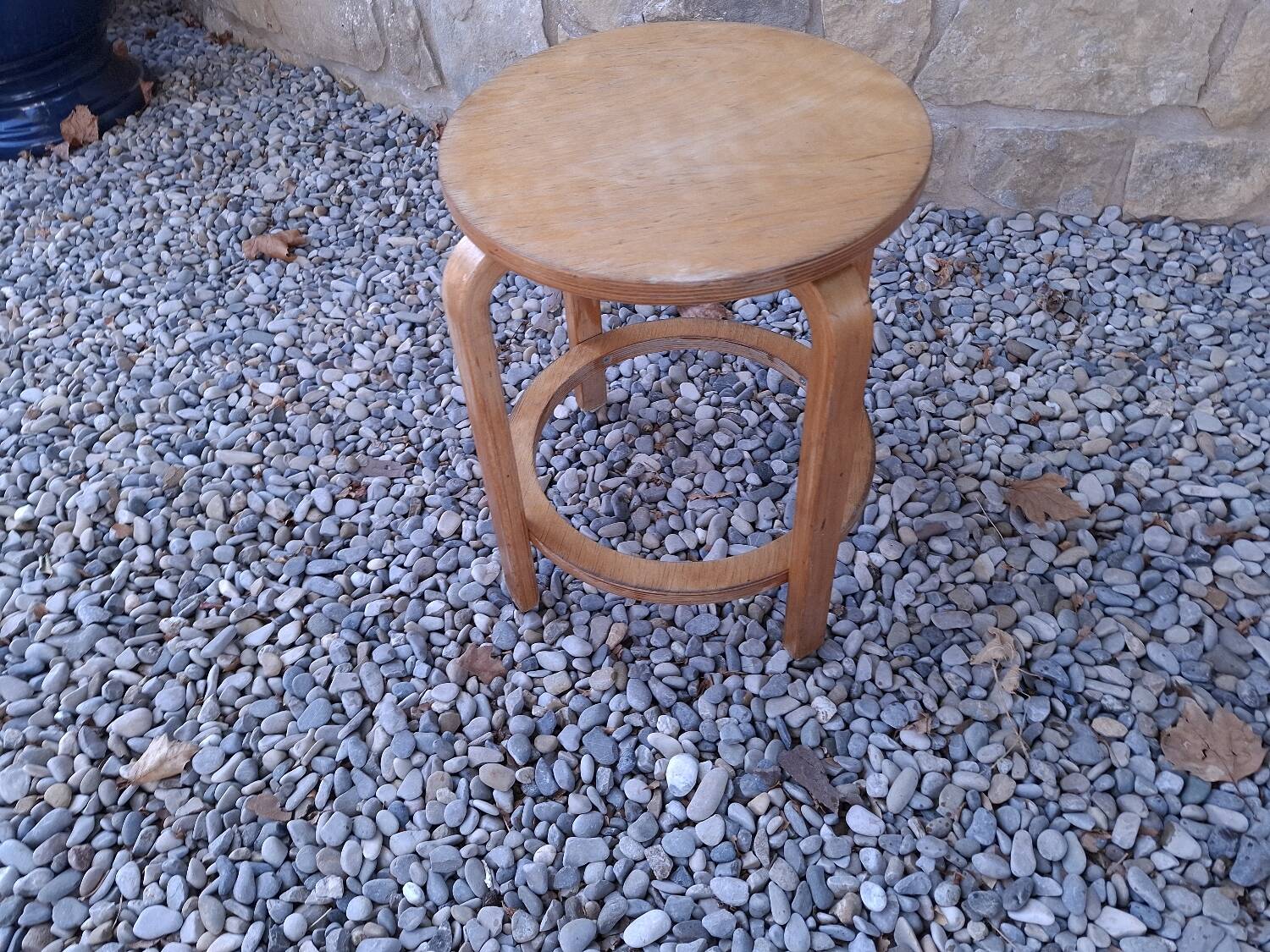Vintage curved wooden stool