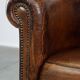 Sturdy, stately and subtle vintage sheepskin club chair