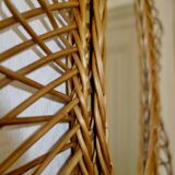 Miroir soleil ovale en rotin des années 60 taille 73x50cm