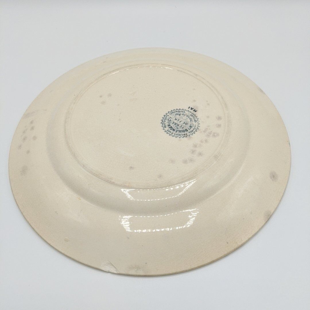 Flat plates in faience Land of Fer Choisy Le Roi, year 50, dark blue décor