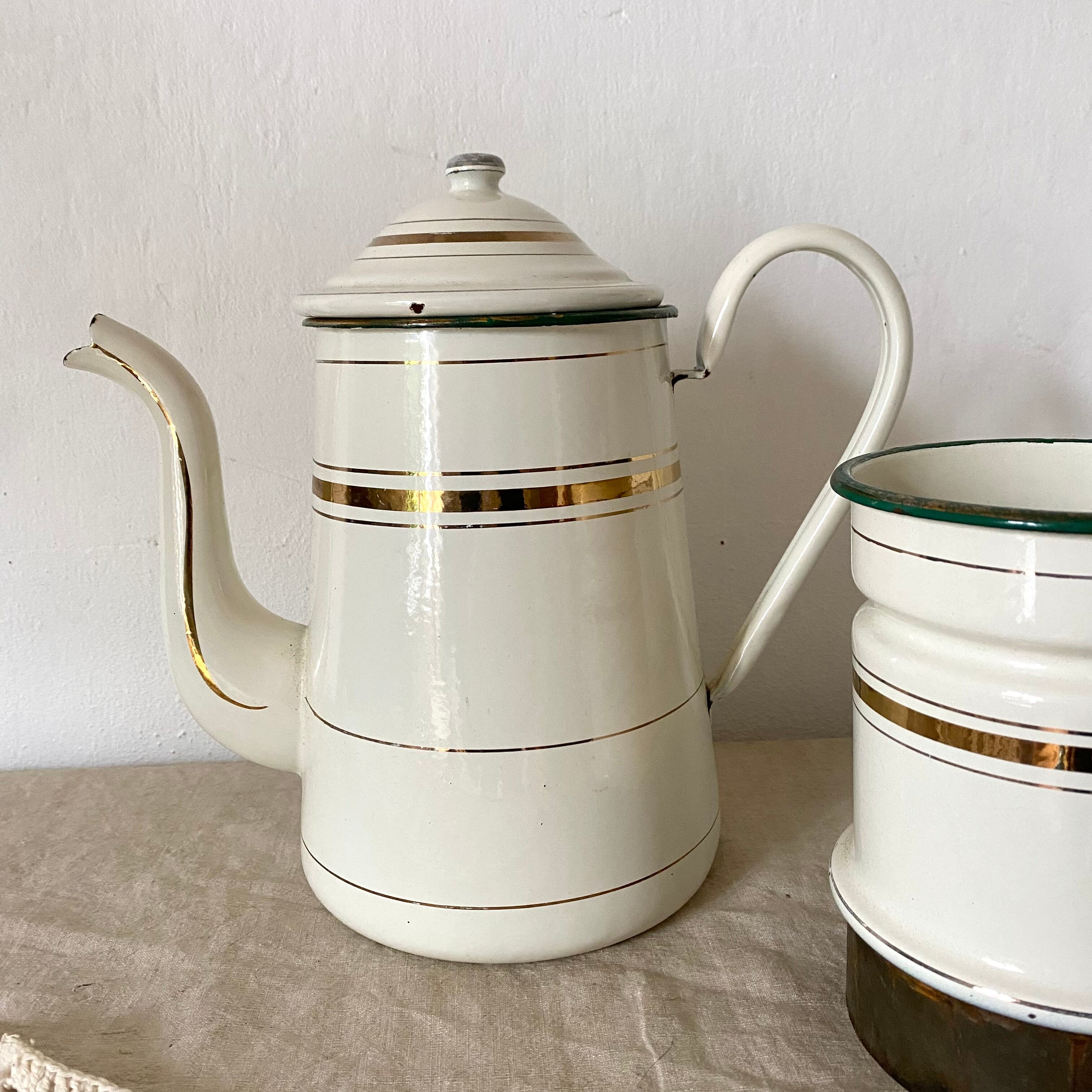 Antique coffee maker in enamelled sheet metal