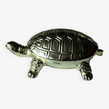 Metal pill box in the shape of a turtle, with a tong, vintage