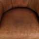 Aged sheepskin clubchair with beautiful vintage patina and comfortable seat