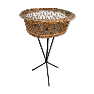 Old rattan basket on foot