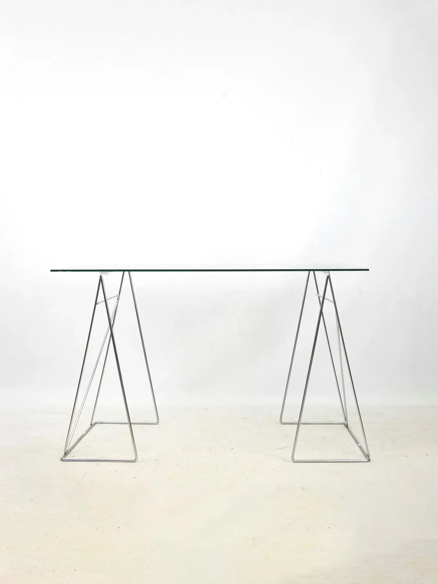Triangular chrome trestle table