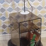 Michel Dumas smoked Plexiglas rolling table.