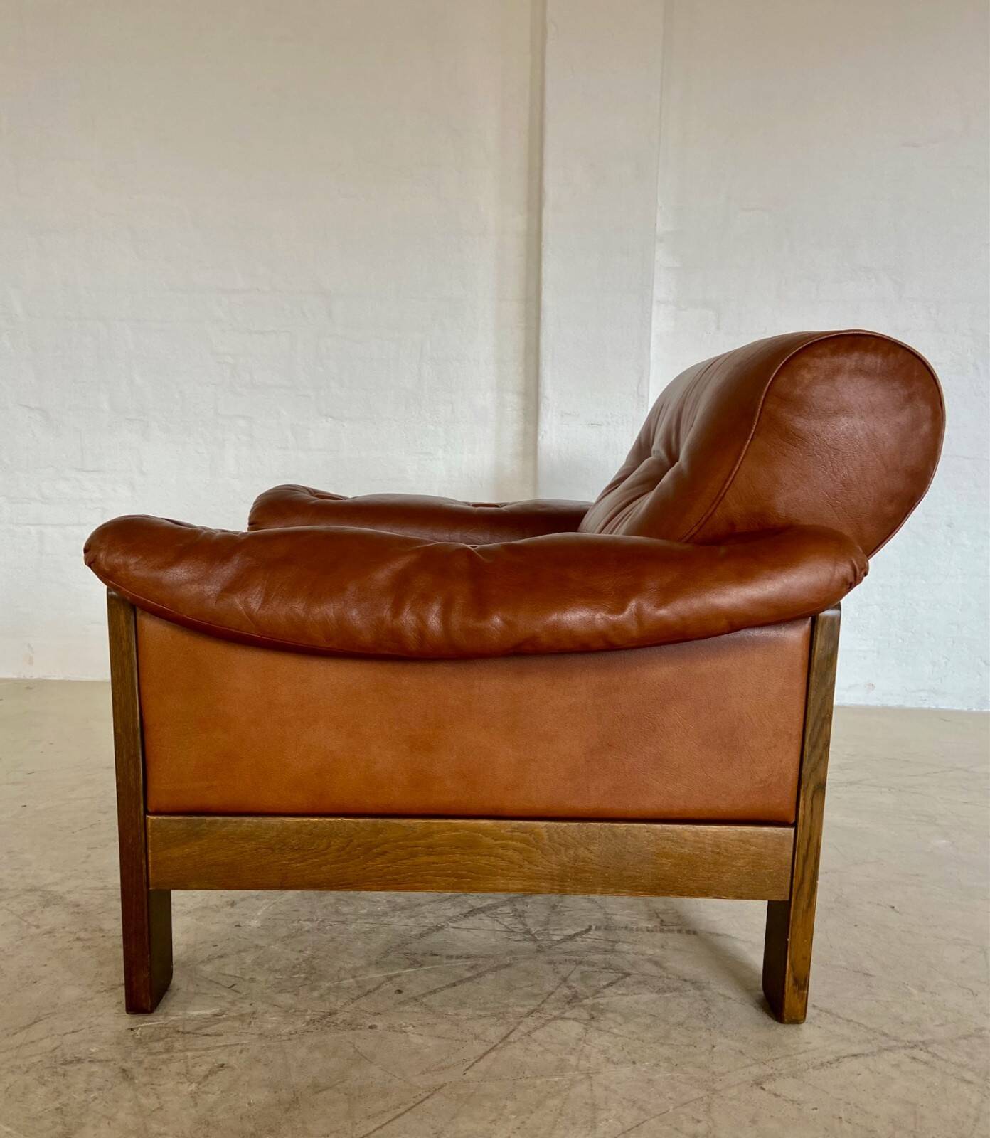 Mid-century vintage Scandinavian leather lounge chair in cognac brown leather