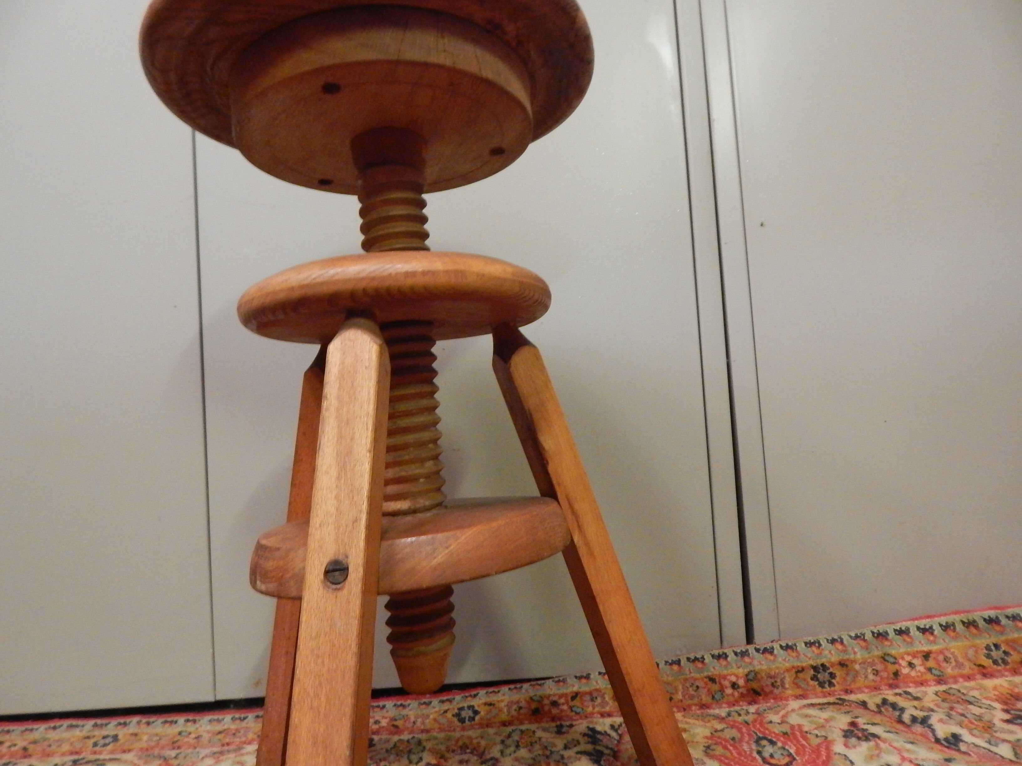 Stool has tripod screw 50 years