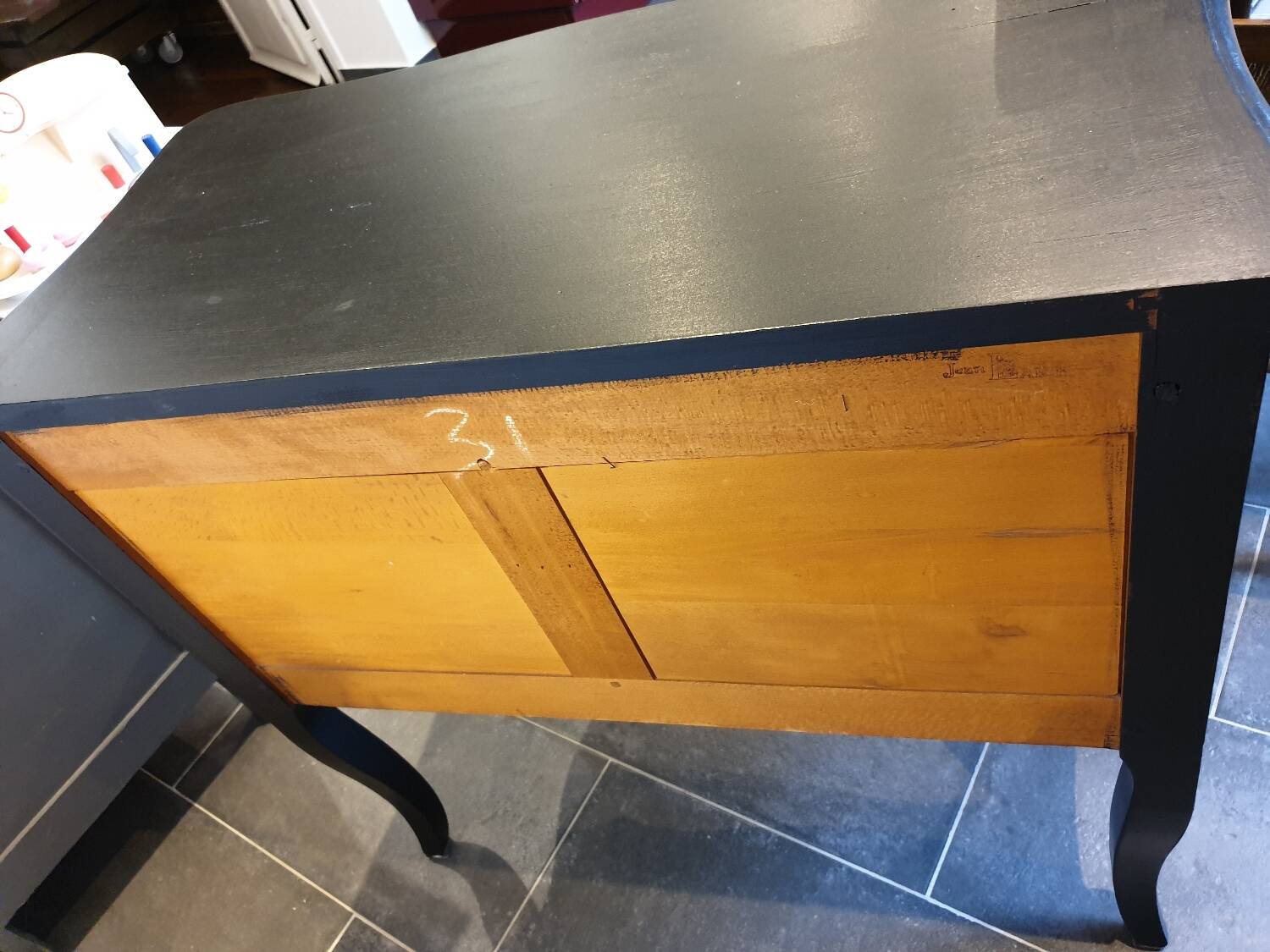 Stamped black Louis XV chest of drawers