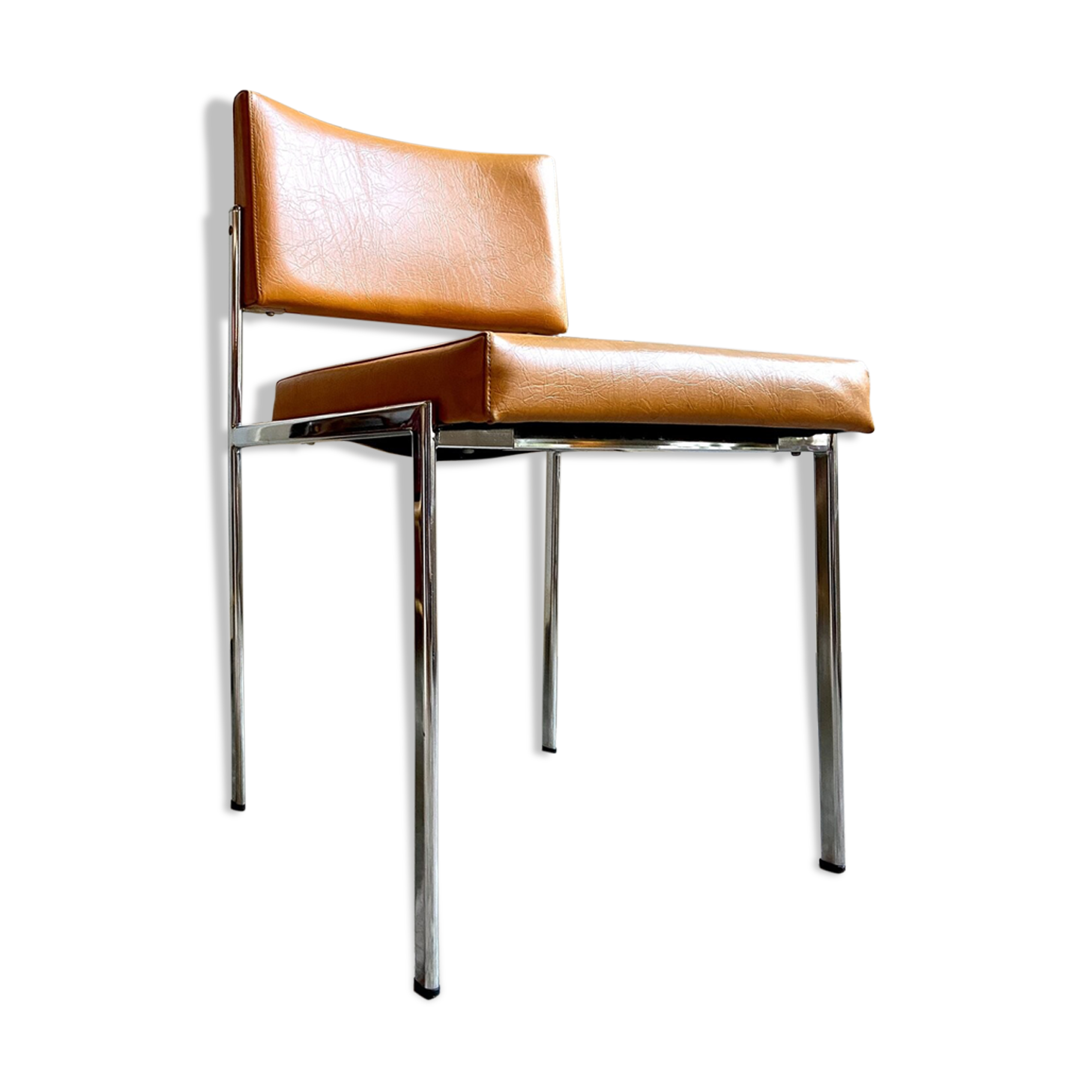 Chair in chromed metal and ochre skaï 1970s