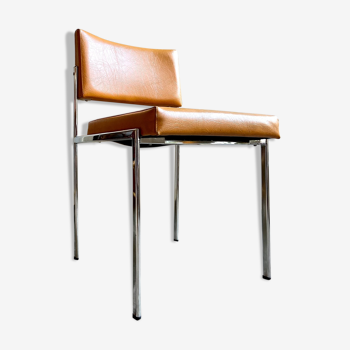 Chair in chromed metal and ochre skaï 1970s