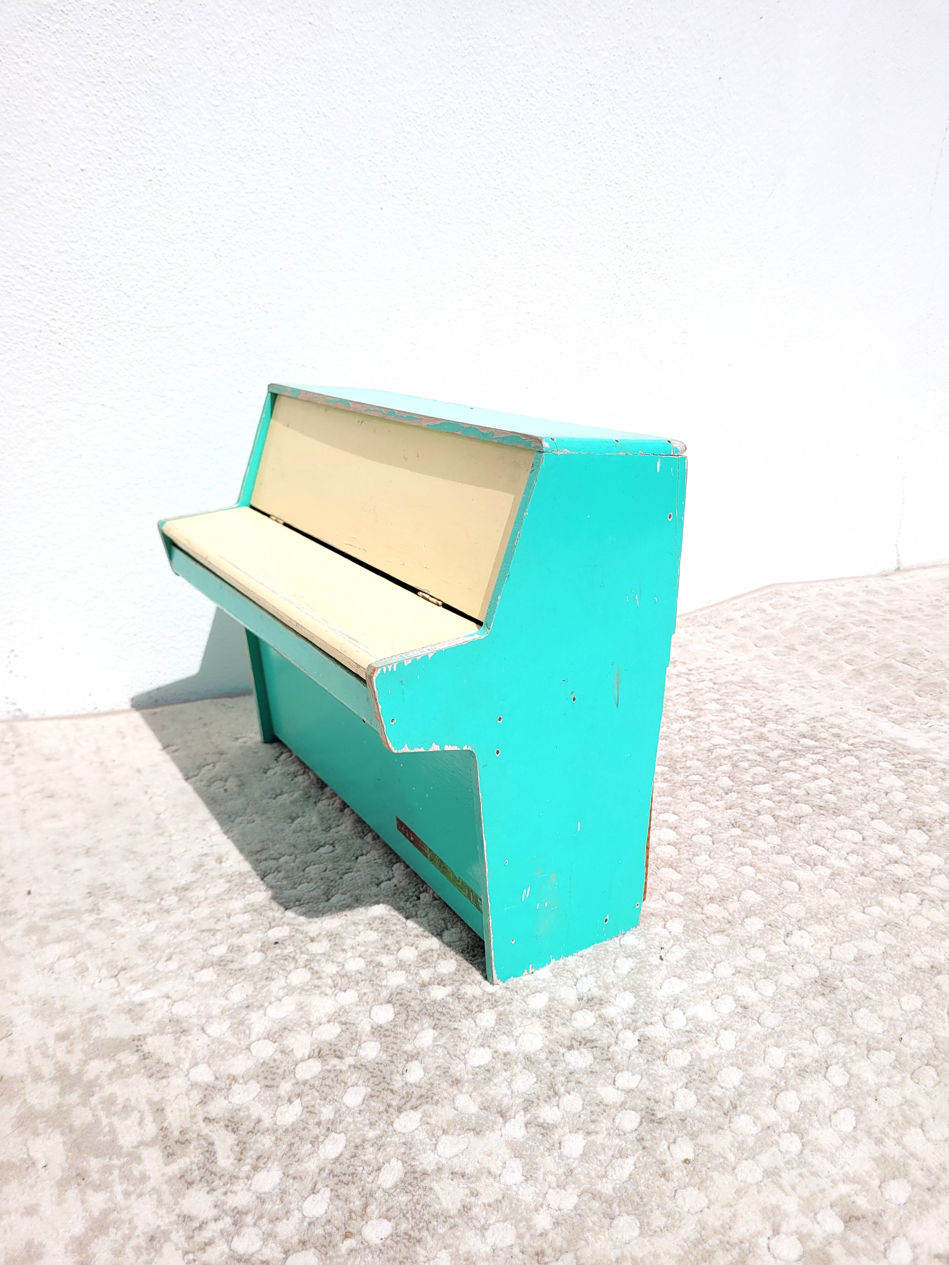 Miniature toy piano green 1950s