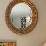 Miroir ovale 19 eme en bois et stuc doré
