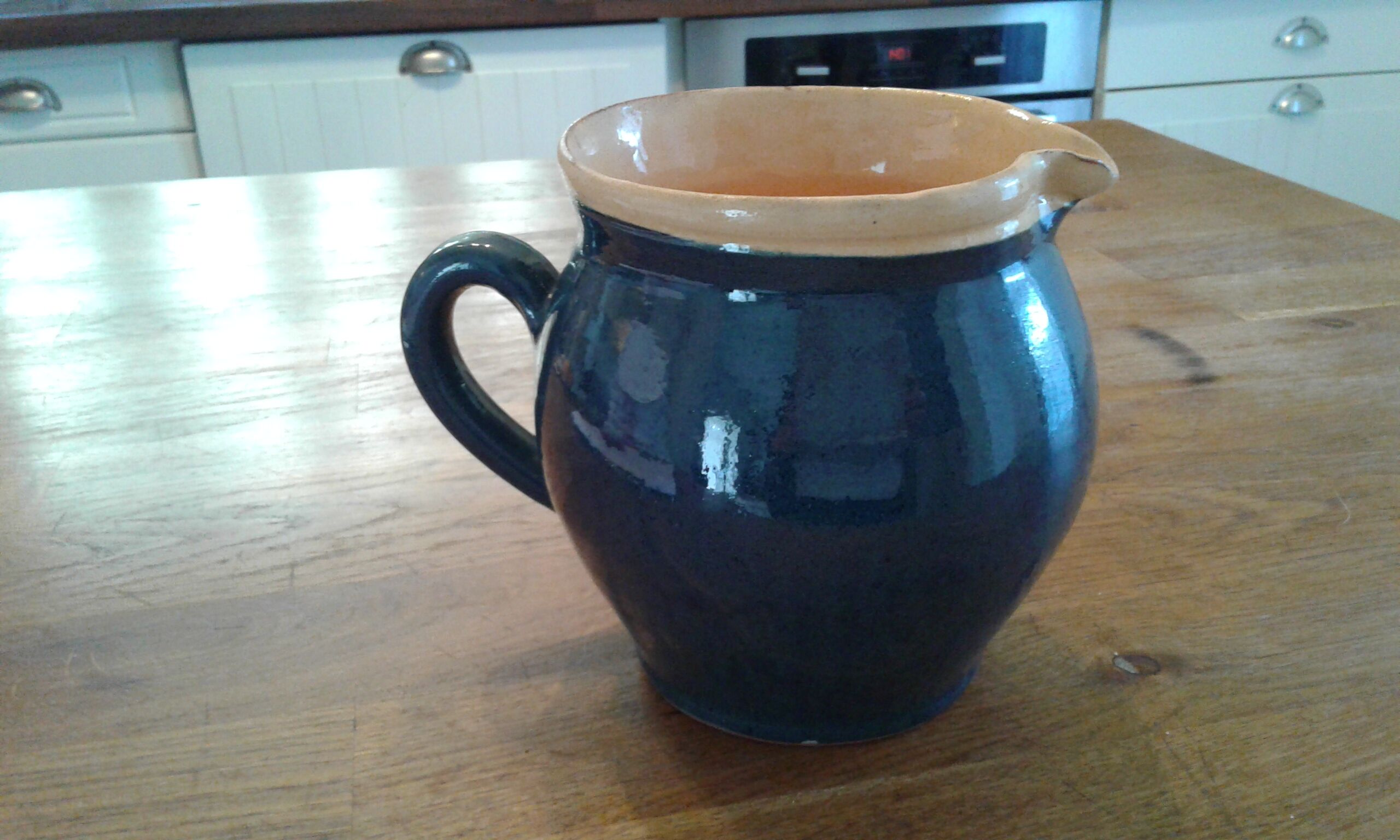 Terracotta pitcher vintage bird décor