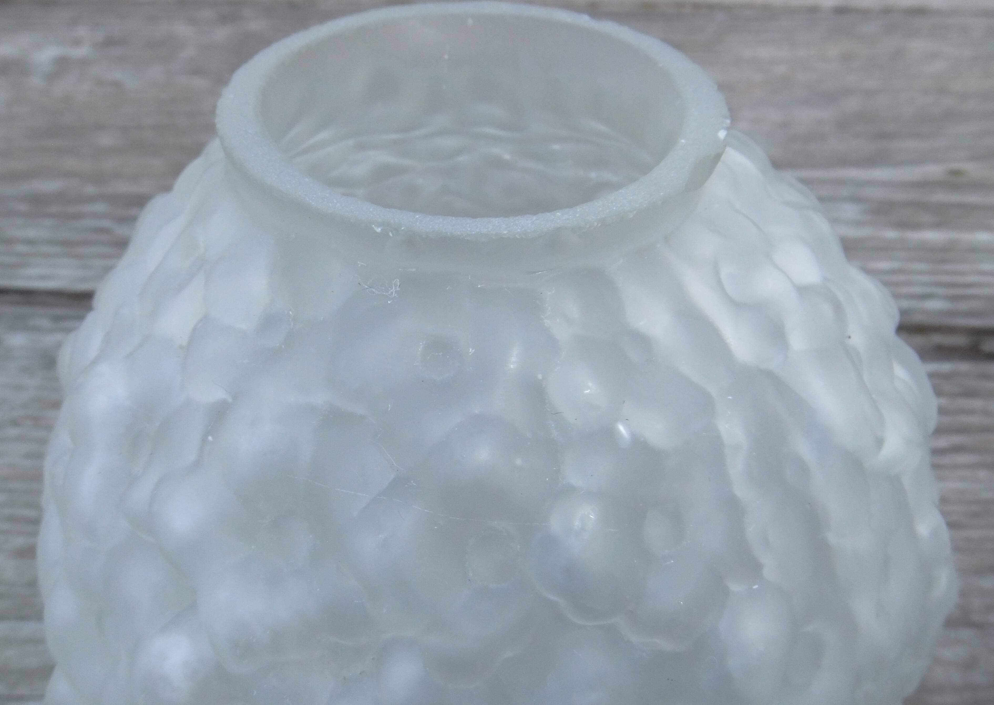 Art Deco ball vase pair with flower and leaf decor