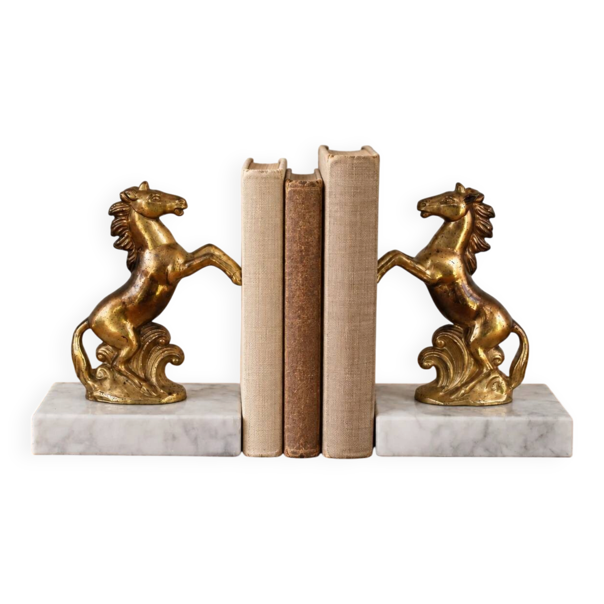 Pair of vintage bookends with rearing horses in gilded metal on marble bases.