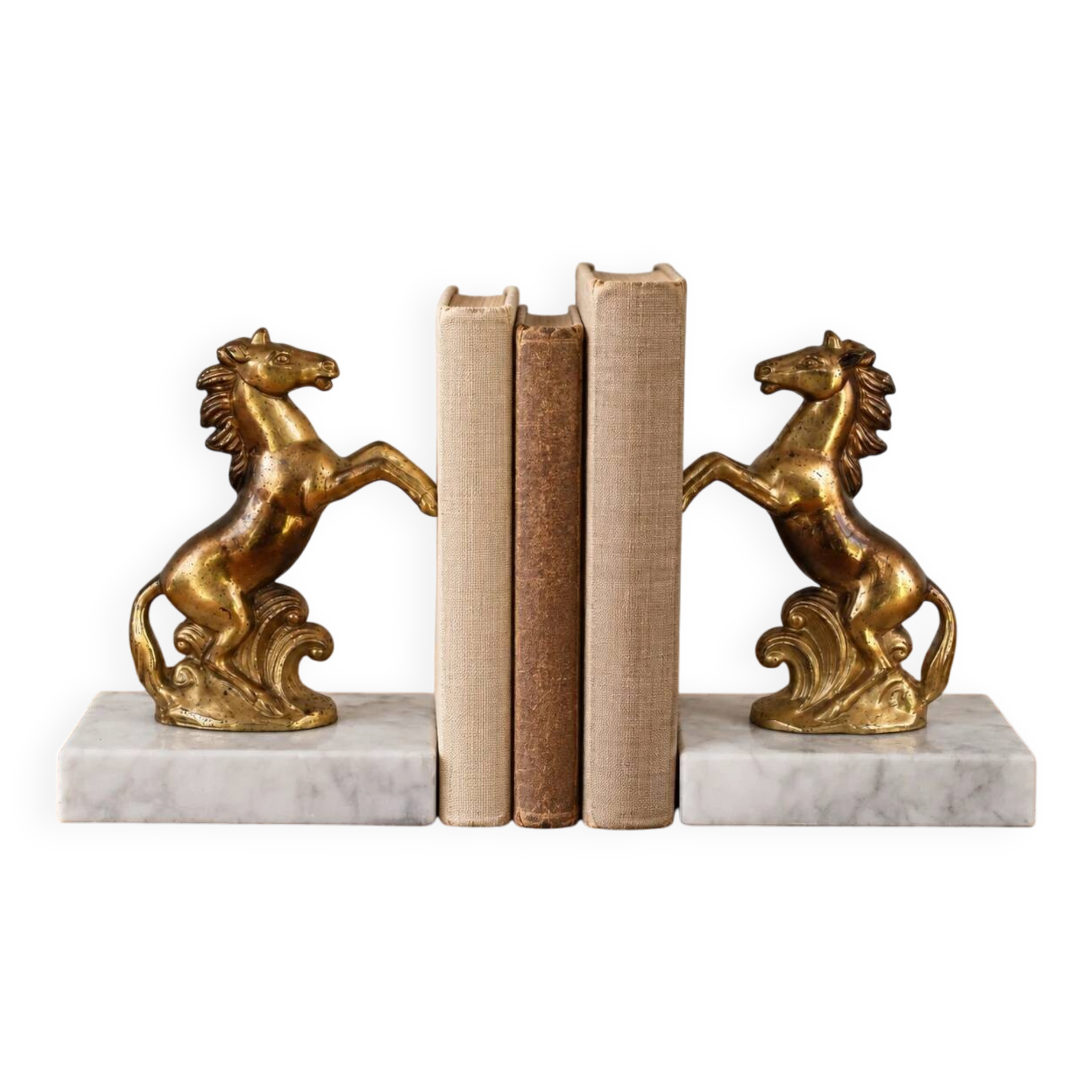 Pair of vintage bookends with rearing horses in gilded metal on marble bases.