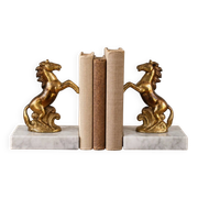 Pair of vintage bookends with rearing horses in gilded metal on marble bases.