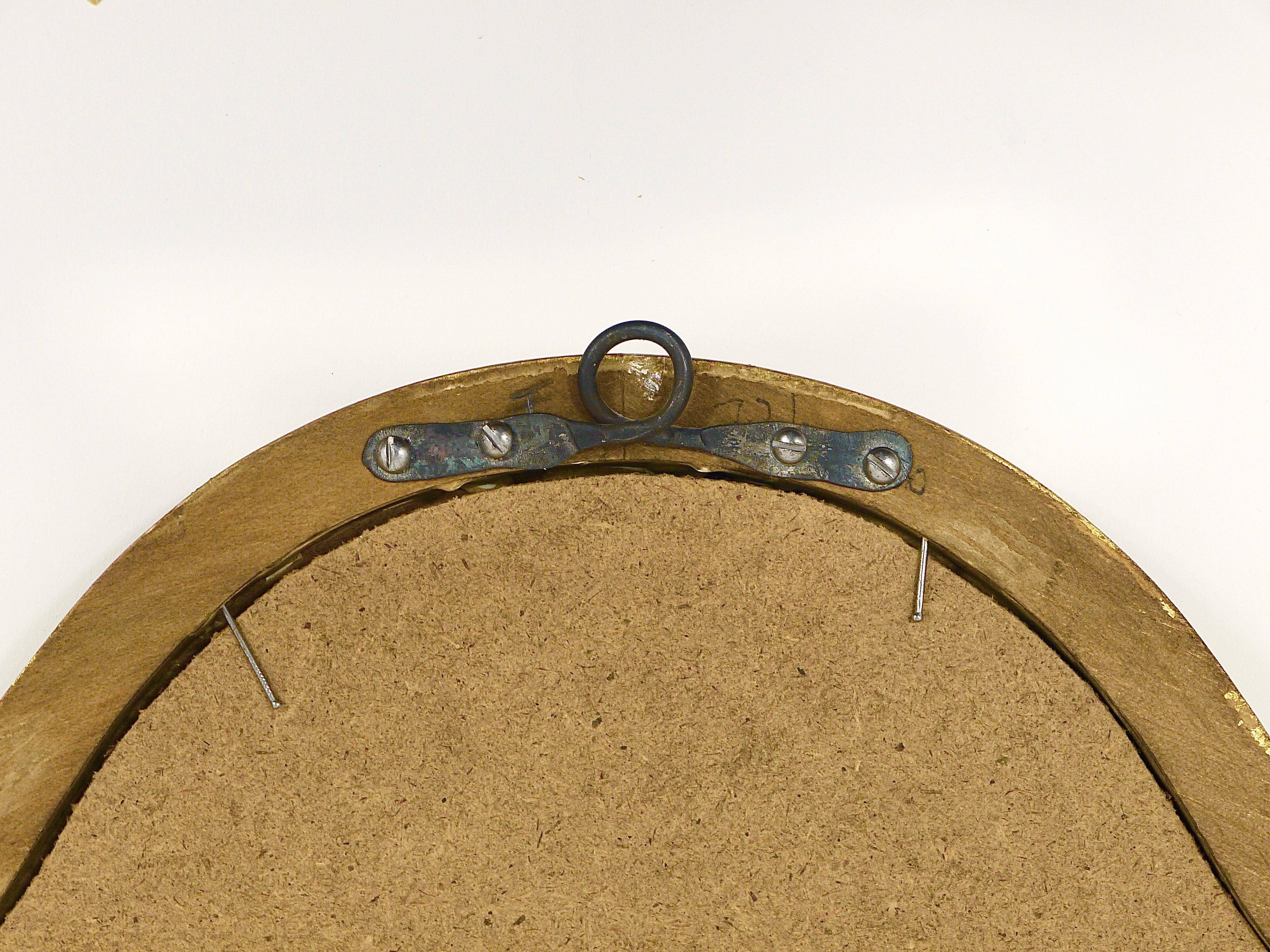 Curved wall mirror in gilded wood Chelini Firenze, mid-century, Italy, 1950s.