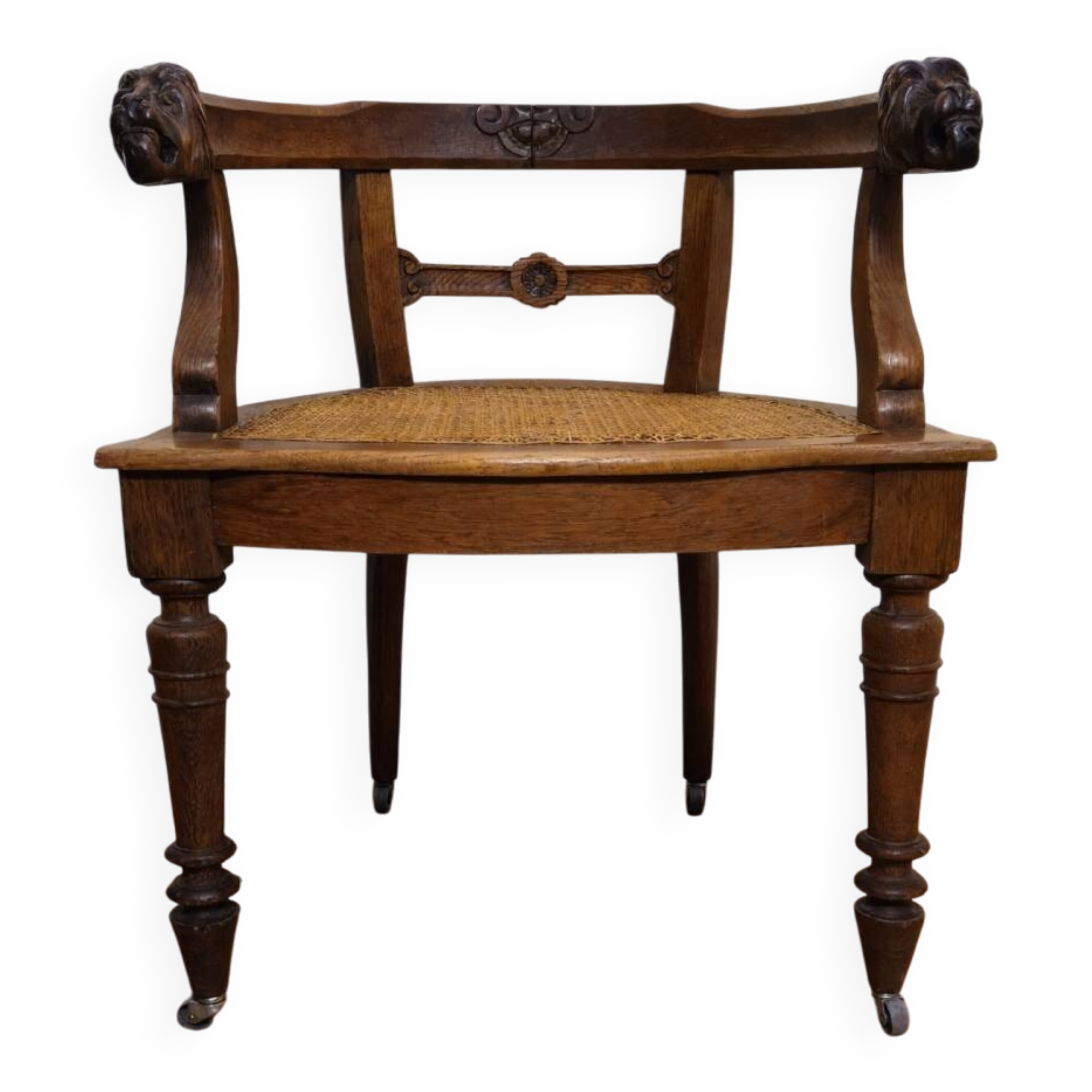 Fauteuil de bureau style Renaissance ancien en bois sculpté et assise cannée