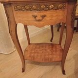 Pair of Louis XV style bedside tables with marquetry and bronze.