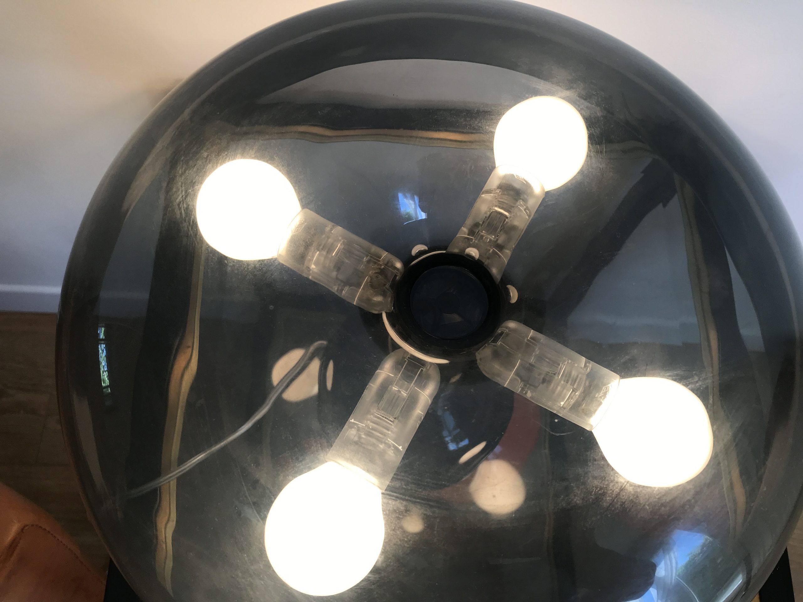 Nessino black pose lamp for artemide by giancarlo mattioli