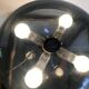 Nessino black pose lamp for artemide by giancarlo mattioli