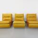 Suite de 3 chauffeuses Roche Bobois vintage en cuir jaune moutarde années 70