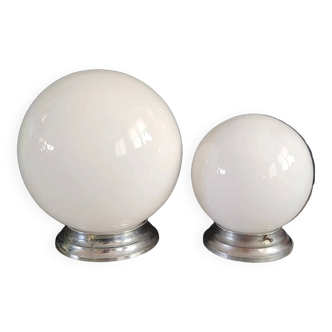Pair of ceiling lights or wall lights with white glass globes.