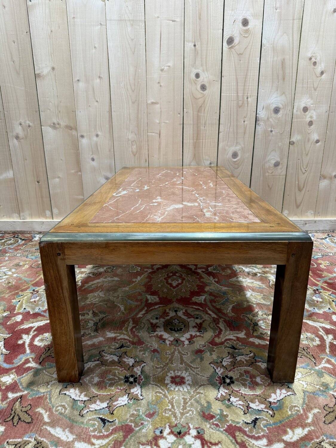 Contemporary coffee table in mahogany and marble.