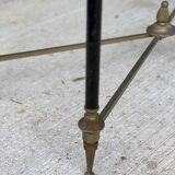 Regency style glass coffee table with crossed legs