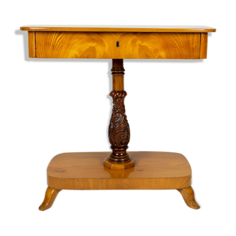 Danish Biedermeier elm occasional table with carved base and drawer