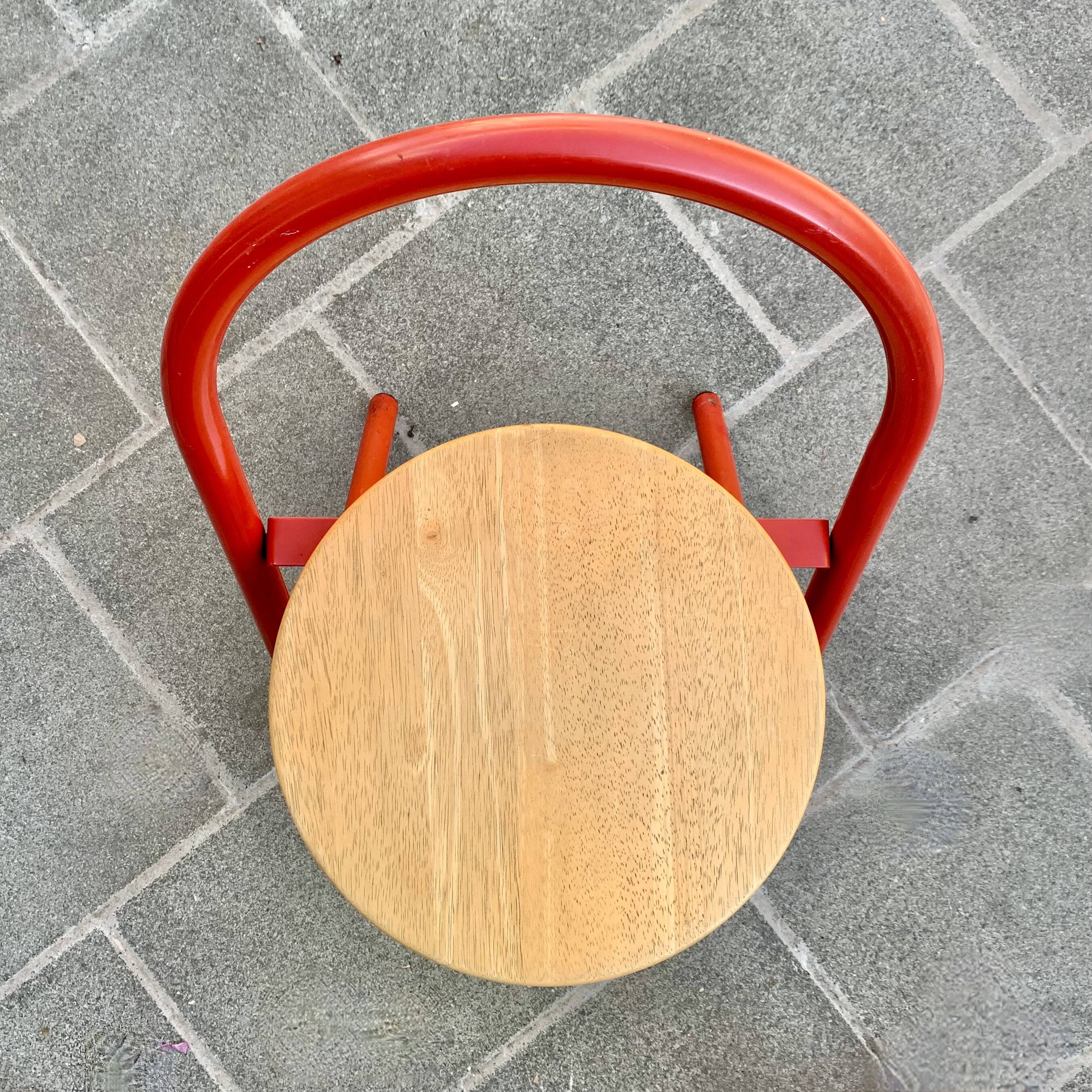 Vintage folding chair in red painted metal and wood
