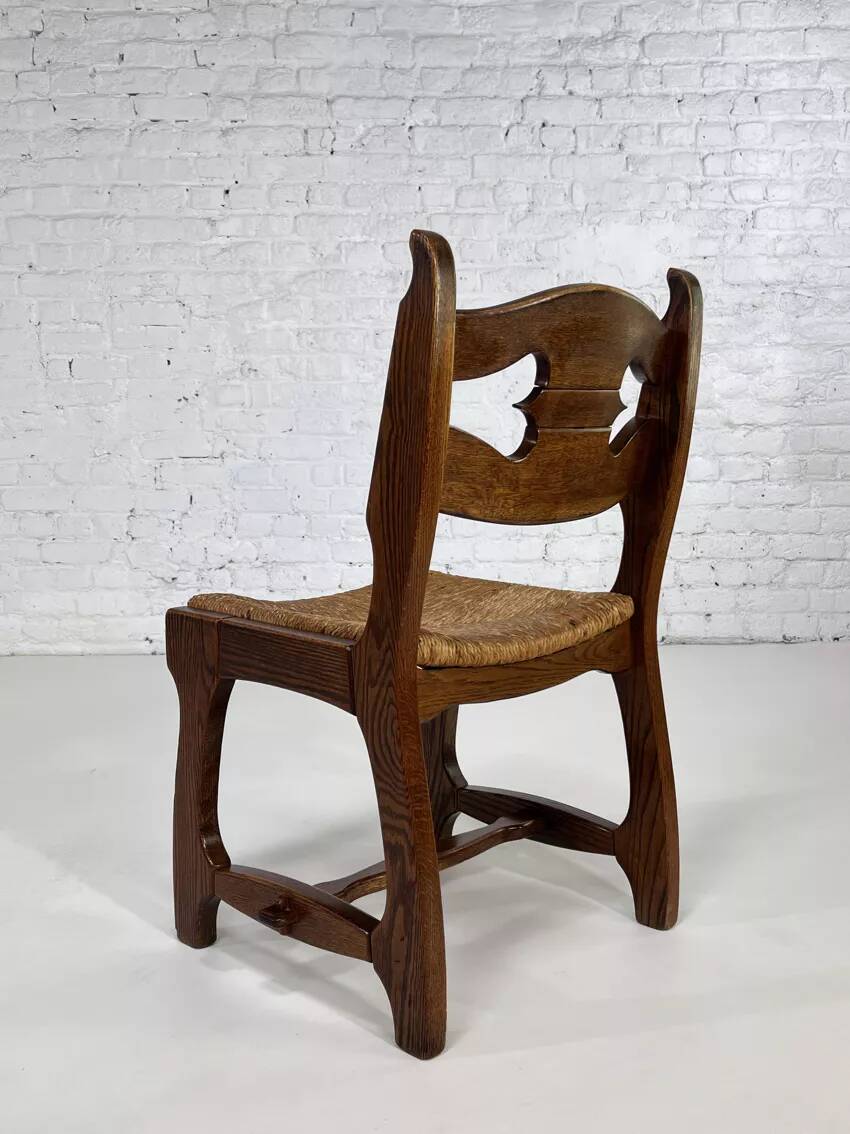 Set of 4 1950s chairs in oak with woven seats.