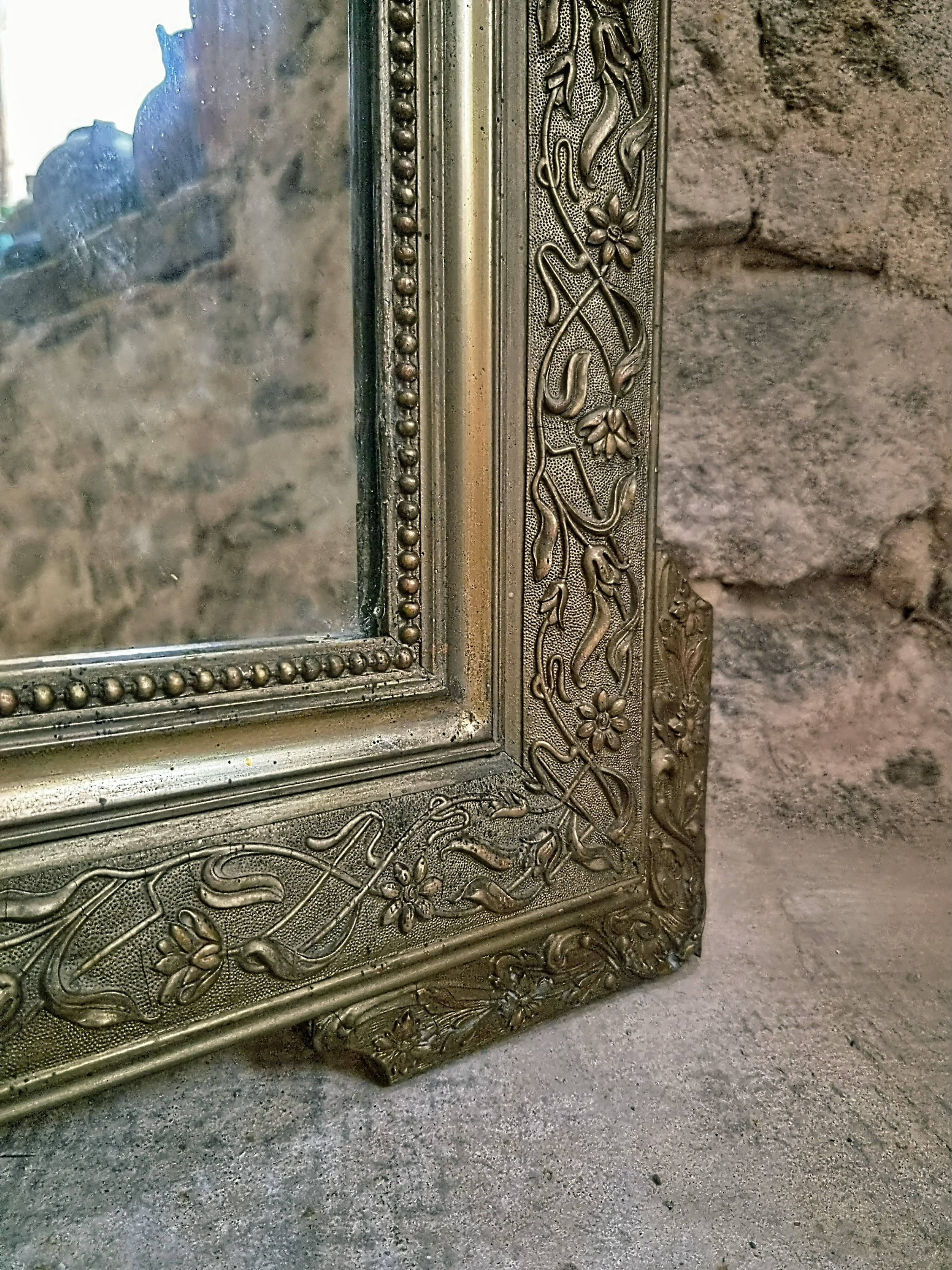 Large French mirror in Napoléon III style with a composition frame, circa 1880–1900.