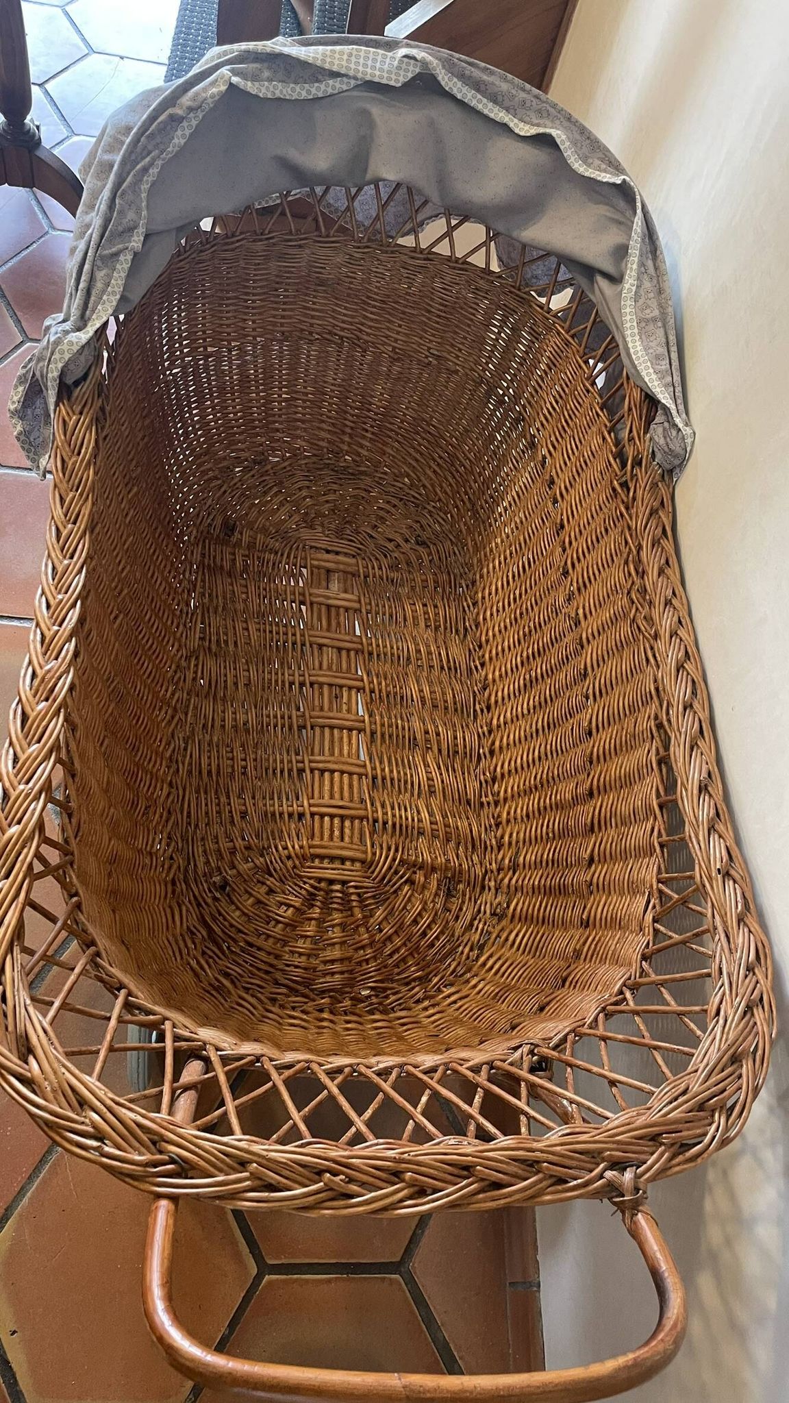 Antique rattan cradle in very good condition. Sold with or without upholstery.