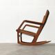 Mid-century model 100 rocking chair in Danish teak by Søren Georg Jensen for Kubus Møbler, 1960s.