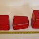 Set of three red painted metal railway boxes with SNCF logo