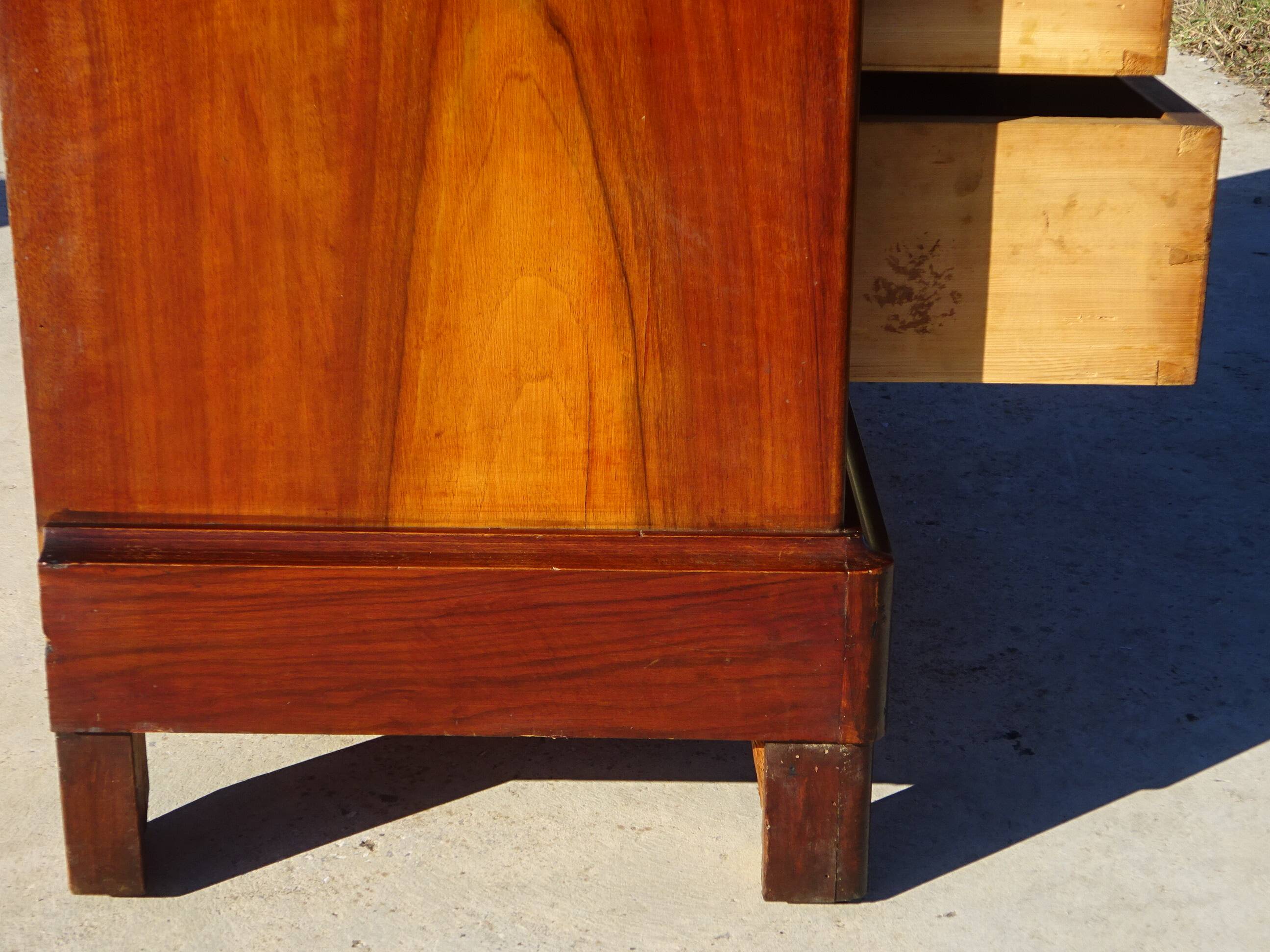 Antique mahogany chest of drawers with white marble.