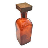 Bouteille en verre couleur ambre avec son bouchon en bois carré de 5x5 vers 1970