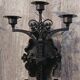 Pair of black wrought iron wall sconces - neo-Gothic style - from the 1950s