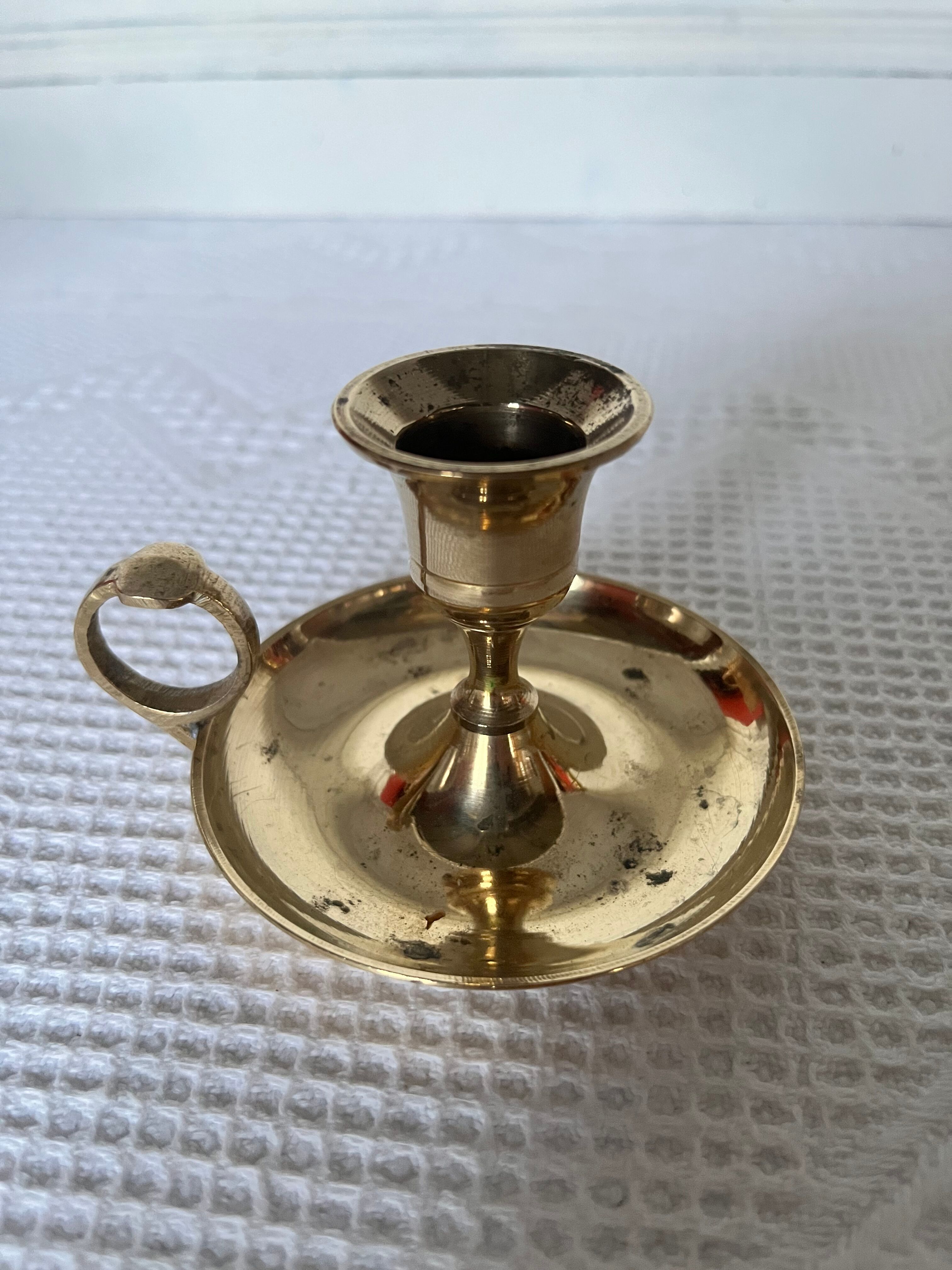 Duo of brass hand candle holders