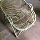 A pair of rattan armchairs