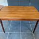 Extendable Scandinavian teak table by Johannes Andersen for Samcom Denmark.