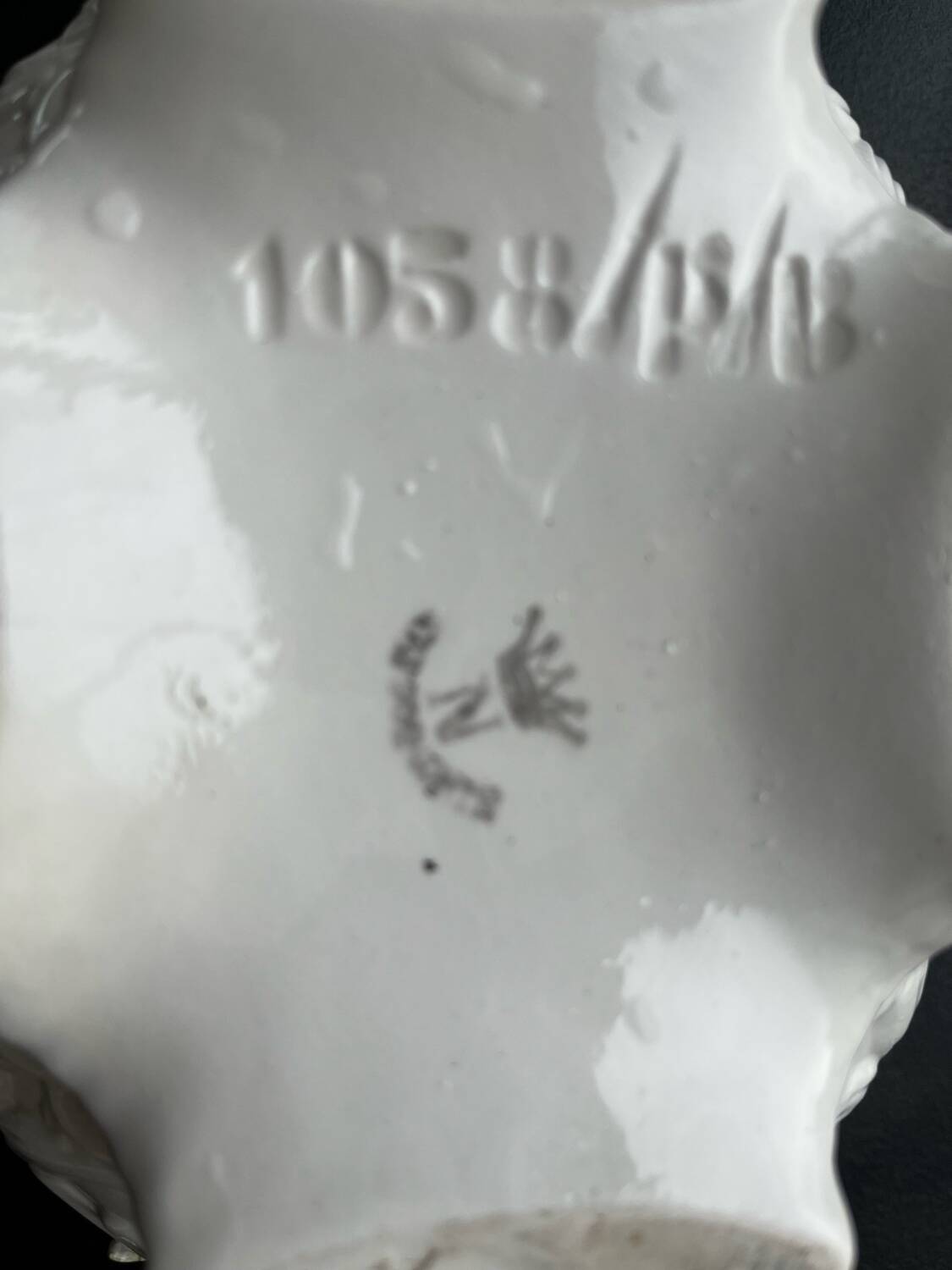 Capodimonte-style porcelain lidded sugar bowl with floral relief