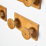 Set of solid pine wall hooks, France, circa 1970