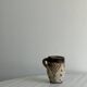 Small old terracotta cup