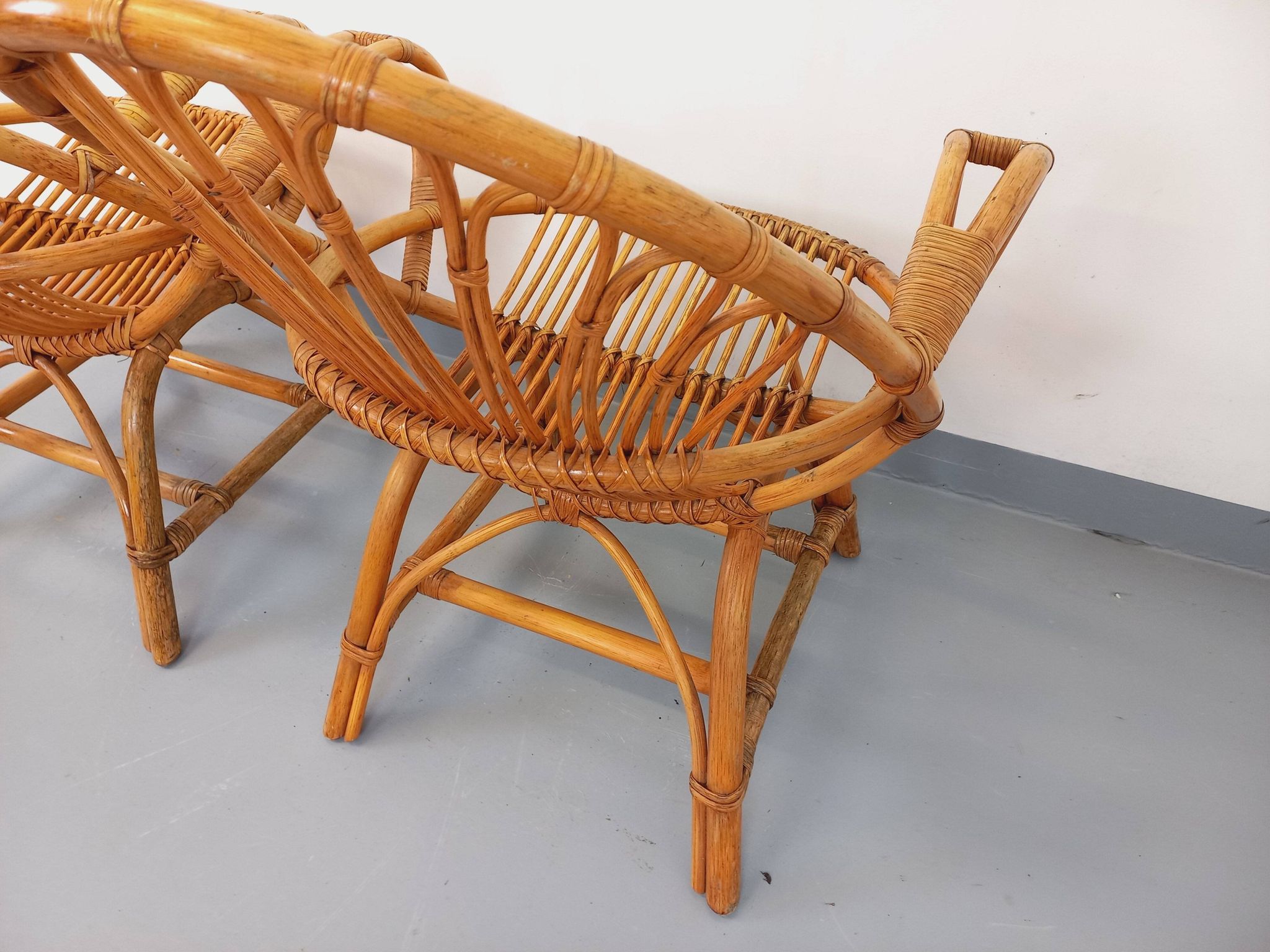 Pair of vintage rattan armchairs from the 60s
