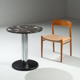 Round sidetable with stone top and three chromed legs